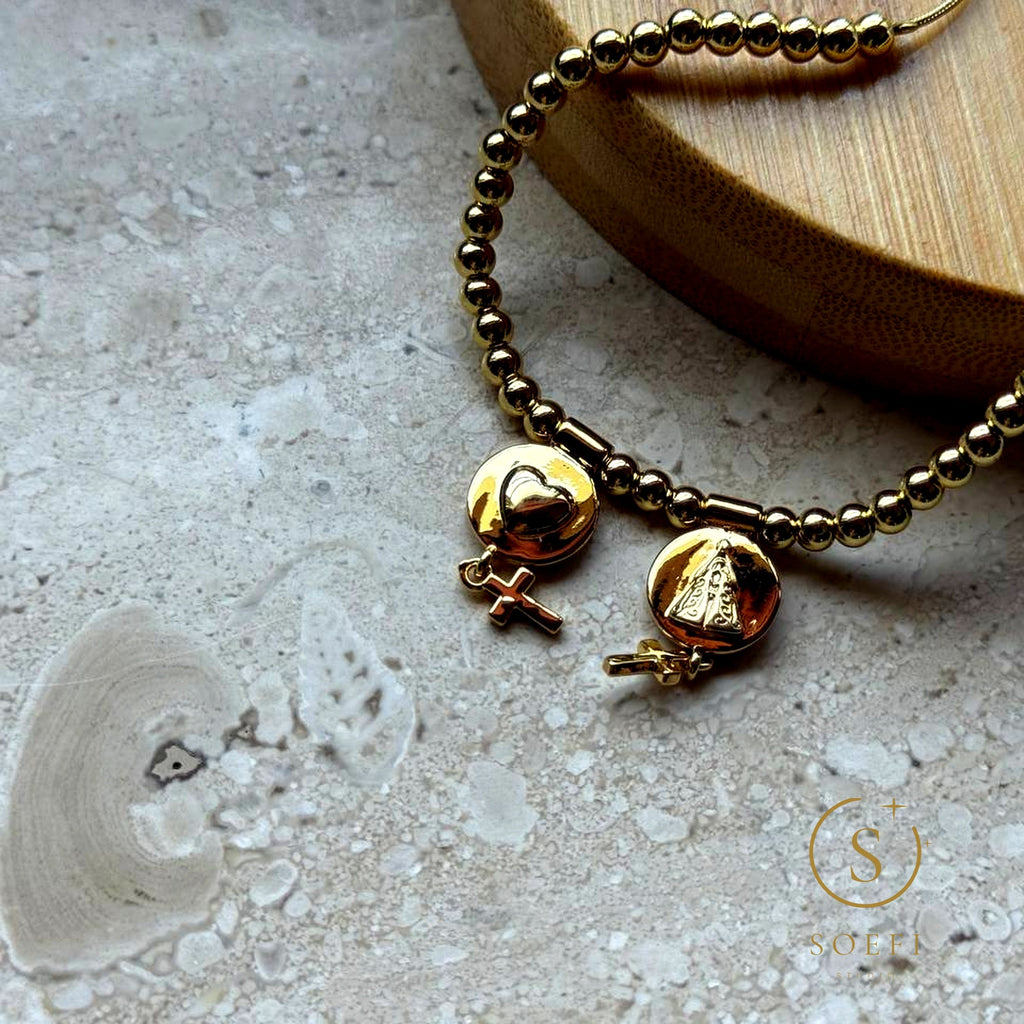 Armband — Kruisbedeltjes, goud